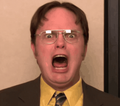 Man In Yellow Shirt Making Funny Face GIF
