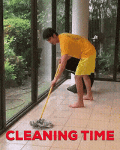 Man In Yellow Shirt Mopping Floor Saying Cleaning Time GIF