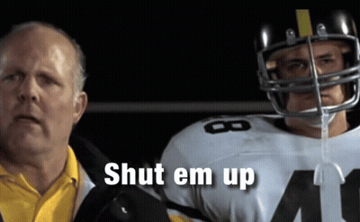 Man In Yellow Shirt Next To Football Player Number 8 GIF