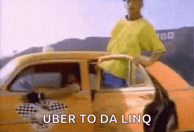 Man In Yellow Shirt Next To Uber Car GIF