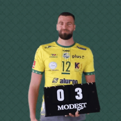 Man In Yellow Shirt Number 12 Holds Scoreboard GIF