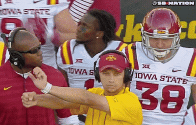 Man In Yellow Shirt Number 38 With Iowa State Football Players GIF