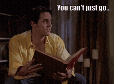 Man In Yellow Shirt Reading Book Saying You Can't Just Go Librum Incendiere GIF