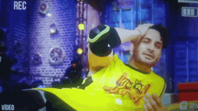 Man In Yellow Shirt Recorded On Video Screen GIF