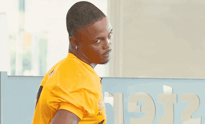 Man In Yellow Shirt Saying Easy Auto GIF