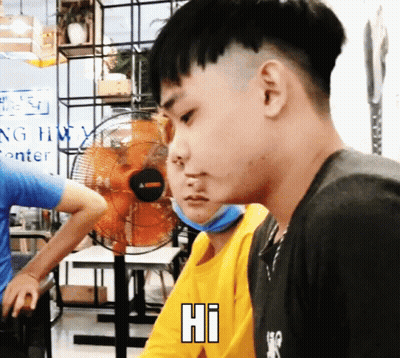 Man In Yellow Shirt Saying Hi To Another GIF