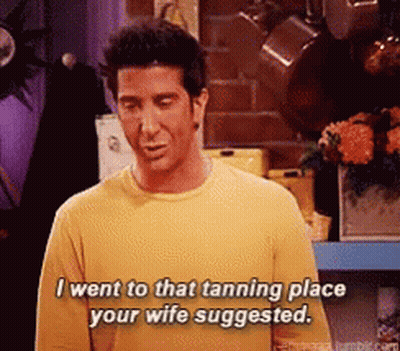 Man In Yellow Shirt Saying I Went To Tanning Place GIF
