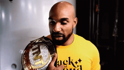 Man In Yellow Shirt Saying Jack Holding Belt GIF