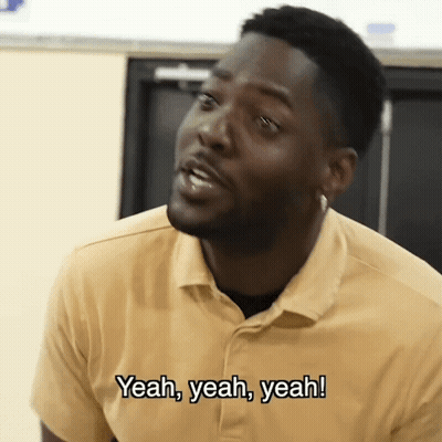 Man In Yellow Shirt Saying Yeah Yeah Yeah GIF