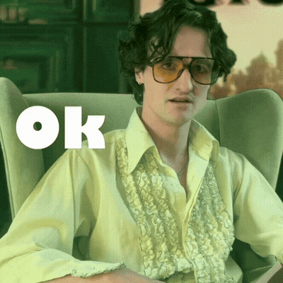 Man In Yellow Shirt Sitting OK GIF
