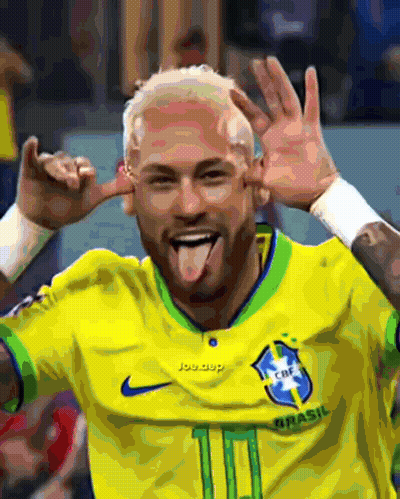 Man In Yellow Shirt Sticking Tongue Out GIF
