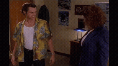 Man In Yellow Shirt Talking To Woman GIF