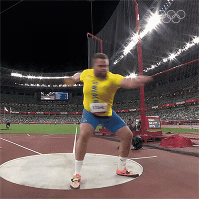 Man In Yellow Shirt Throwing Discus Olympics GIF