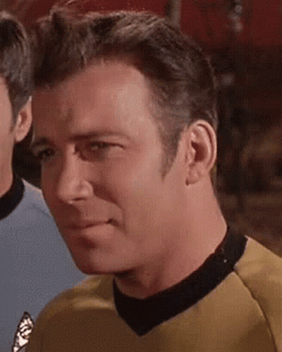 Man In Yellow Shirt With Black Collar GIF