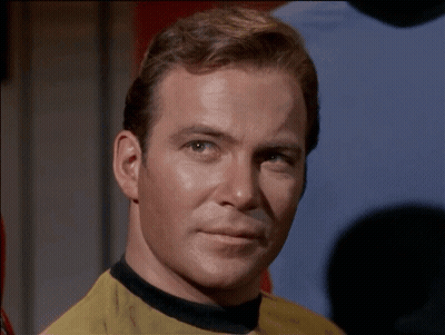 Man In Yellow Shirt With Black Collar GIF