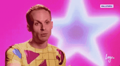 Man In Yellow Shirt With Blue Star On Pink Background GIF