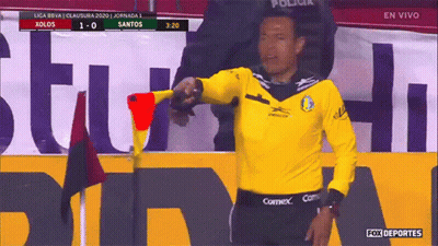Man In Yellow Shirt With COMEX On Shorts GIF