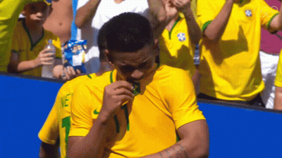Man In Yellow Shirt With Number 1 GIF