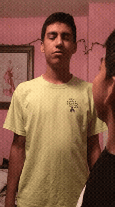 Man In Yellow Shirt With Tree GIF