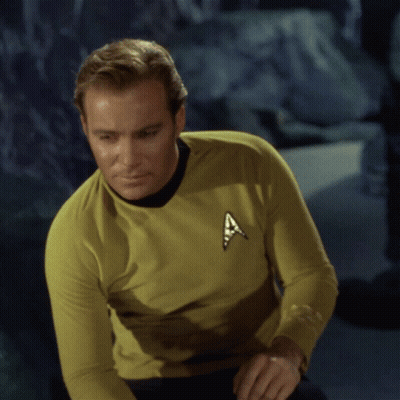 Man In Yellow Star Trek Logo Shirt GIF
