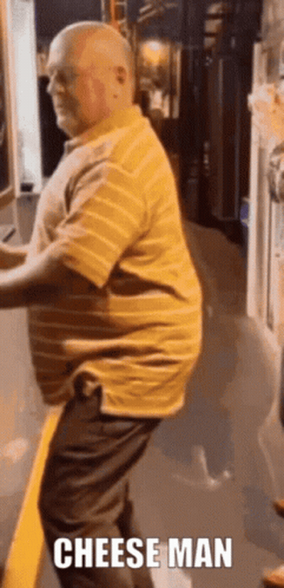 Man In Yellow Striped Shirt Dancing With Cheese Man Sticker GIF