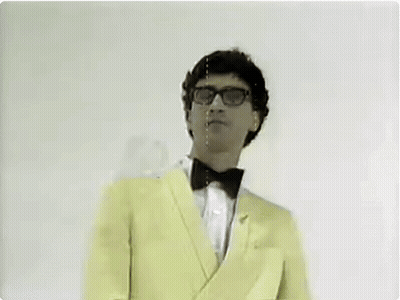 Man In Yellow Suit And Bow Tie GIF