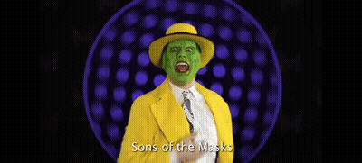 Man In Yellow Suit And Green Mask GIF