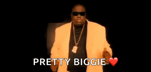 Man In Yellow Suit And Sunglasses Thumbs Up Saying Pretty Biggie GIF