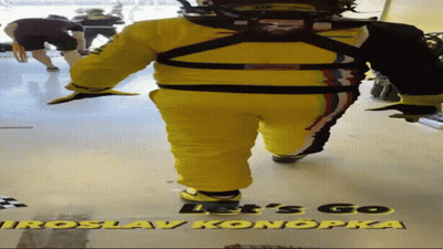Man In Yellow Suit Walking Saying Let's Go GIF