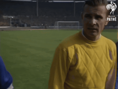 Man In Yellow Sweater GIF