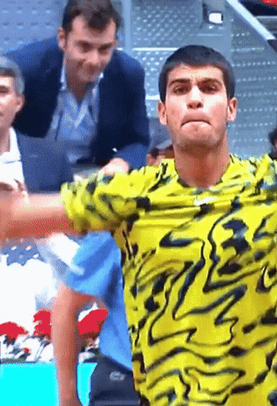 Man In Yellow Swirl Shirt GIF