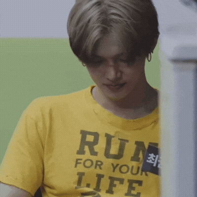 Man In Yellow T-Shirt Saying Run For Your Life GIF