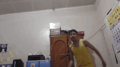 Man In Yellow Tank Top Dancing GIF