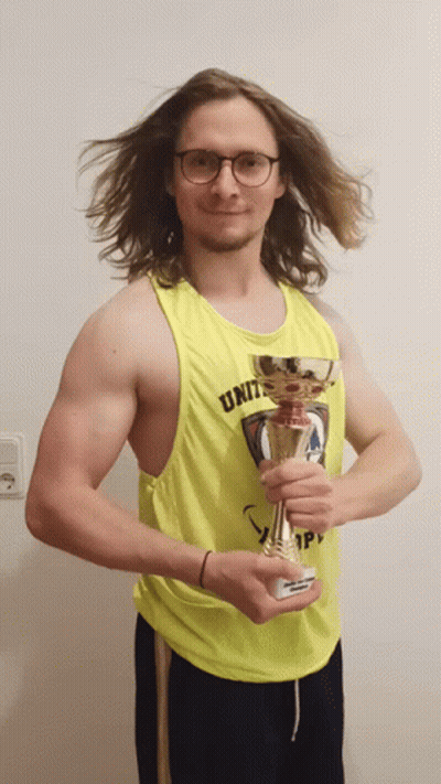 Man In Yellow Tank Top Holding Trophy GIF