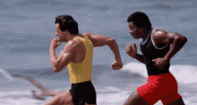 Man In Yellow Tank Top Running Beach GIF