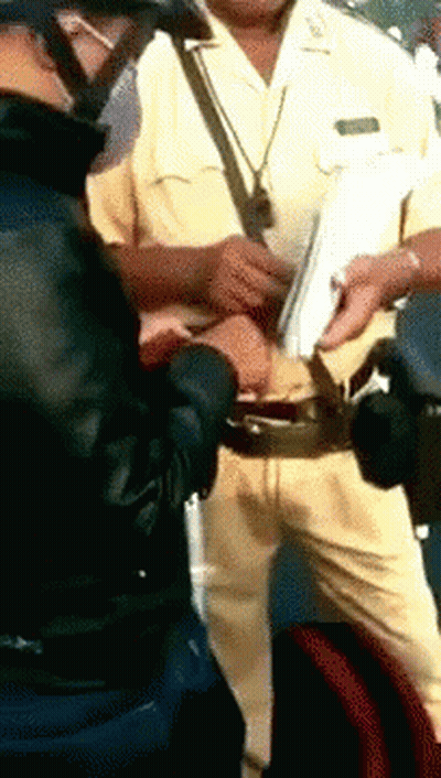 Man In Yellow Uniform Holding Paper GIF