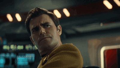 Man In Yellow Uniform Serious Expression GIF
