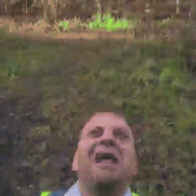 Man In Yellow Vest And Tie Screaming GIF