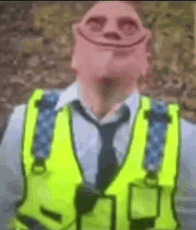 Man In Yellow Vest And Tie With Smiley Face GIF