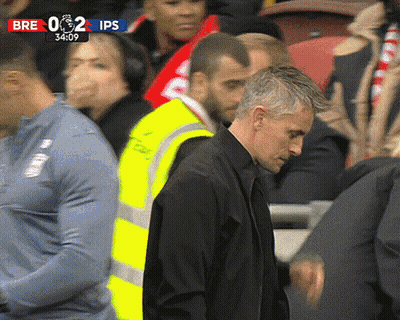 Man In Yellow Vest Before Crowd Score 0-2 GIF
