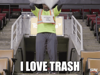 Man In Yellow Vest Holding Sign My Picks Are Trash GIF