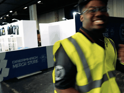 Man In Yellow Vest Smiling At Dreamhack GIF
