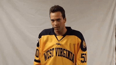 Man In Yellow West Virginia Jersey Number 50 GIF