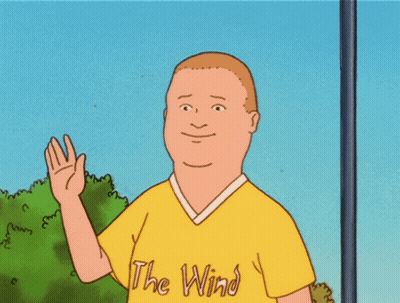 Man In Yellow Wind Shirt GIF