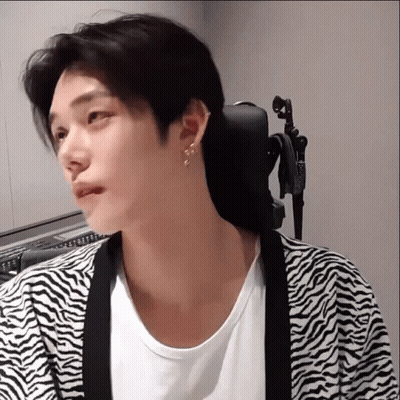 Man In Zebra Print Cardigan And White Shirt GIF