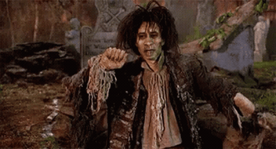 Man In Zombie Costume In Cemetery GIF