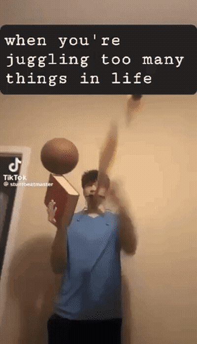 Man Juggling Basketball On Book Saying When You Re Juggling Too Many Things In Life GIF