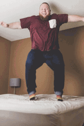 Man Jumping For Joy Hitting The Ceiling GIF