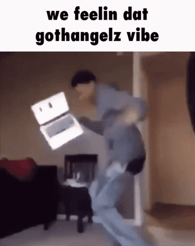 Man Jumping Holding Laptop Saying We Feelin Dat Gothangelz Vibe GIF