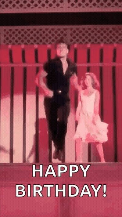 Man Jumping In Air While Woman Dances GIF